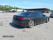 ✅ 2017 Audi A8 Sport • VIN: WAU43AFD7HN014742 • Лот: 42919334. Опубликован ранее на IAAI с пробегом 125 241 миль. Бесплатный доступ к архиву аукционных продаж из США и подробный отчёт об истории автомобиля на DreamBid. Изображение 4.