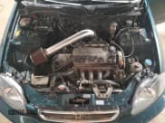 ✅ 1997 Honda Civic DX • VIN: 1HGEJ6529VL024076 • Lot: 74904484. Listed on Copart with 203,570 mi. Free auction sales archive from the USA and detailed vehicle history report at DreamBid. Image 11.