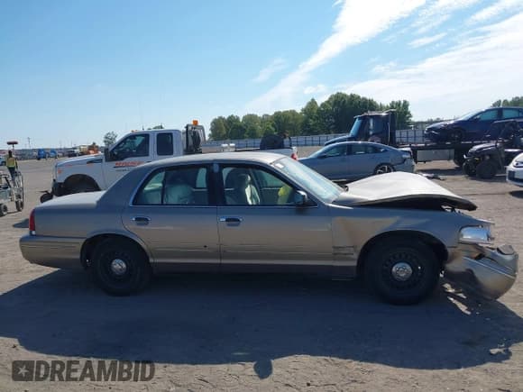 ✅ 2001 Ford Crown Victoria • VIN: 2FAFP73W01X131209 • Lot: 43033250. Listed on IAAI with 241,898 mi. Free auction sales archive from the USA and detailed vehicle history report at DreamBid. Image 12.