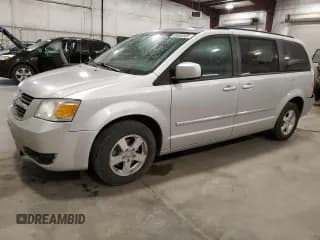 ✅ 2009 Dodge Grand Caravan SXT • VIN: 2D8HN54XX9R596411 • Лот: 69680685. Опубликован ранее на Copart с пробегом 169 620 миль. Бесплатный доступ к архиву аукционных продаж из США и подробный отчёт об истории автомобиля на DreamBid. Изображение 1.