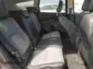 2018 Ford Escape SE z VIN 1FMCU9GD6JUD48647, wystawiony jako Copart lot #70868345 z przebiegiem 102 072 mil mil oraz Szkoda całkowita • Salvage title. Historia ofert i sprzedaży dostępna na DreamBid. Obrazek 11.