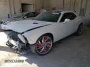 ✅ 2014 Dodge Challenger SXT • VIN: 2C3CDYAG6EH233769 • Lot: 66271134. Wystawiony na Copart z przebiegiem 128 320 mil. Bezpłatny archiwum sprzedaży aukcyjnych z USA i szczegółowy raport historii pojazdu na DreamBid. Zdjęcie 1.