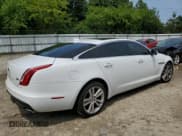 ✅ 2016 Jaguar XJ Portfolio • VIN: SAJWJ2GD9G8W01545 • Lot: 66095984. Wystawiony na Copart z przebiegiem Nie podano. Bezpłatny archiwum sprzedaży aukcyjnych z USA i szczegółowy raport historii pojazdu na DreamBid. Zdjęcie 3.