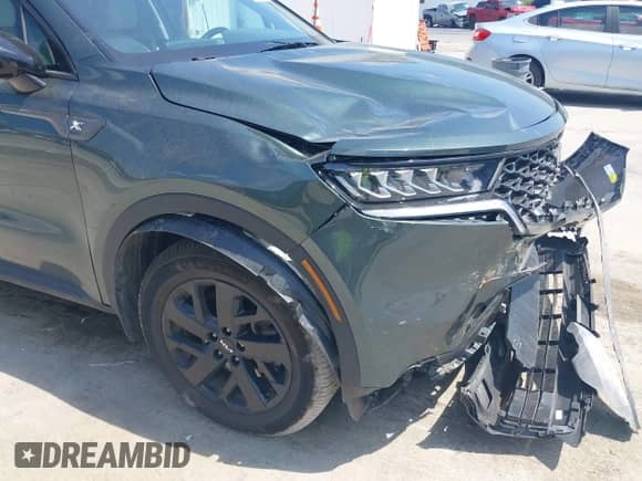 2022 Kia Sorento X-Line S z VIN 5XYRLDLC7NG148434, wystawiony jako IAAI lot #42958663 z przebiegiem 34 462 mil mil oraz . Historia ofert i sprzedaży dostępna na DreamBid. Obrazek 18.