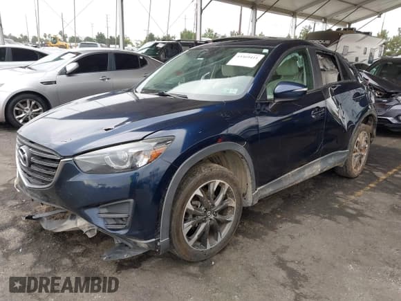 ✅ 2016 Mazda CX-5 Grand Touring • VIN: JM3KE2DY8G0885958 • Lot: 43369411. Wystawiony na IAAI z przebiegiem 171 093 mil. Bezpłatny archiwum sprzedaży aukcyjnych z USA i szczegółowy raport historii pojazdu na DreamBid. Zdjęcie 2.