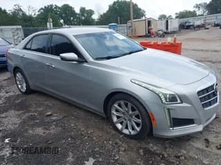 ✅ 2014 Cadillac CTS Luxury RWD • VIN: 1G6AR5S38E0173628 • Lot: 42343647. Listed on IAAI with 166,035 mi. Free auction sales archive from the USA and detailed vehicle history report at DreamBid. Image 1.