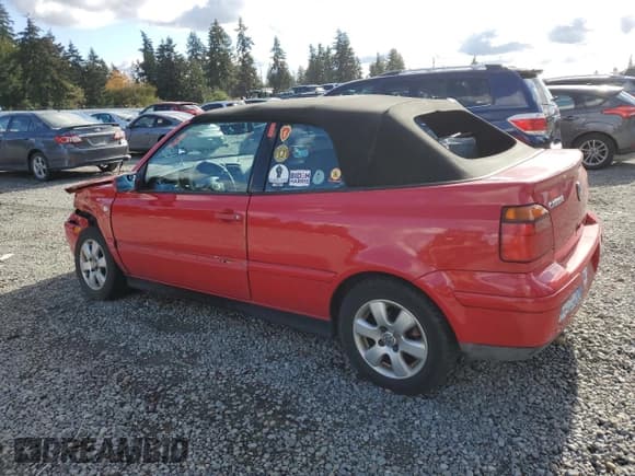 ✅ 2001 Volkswagen Cabriolet GLX • VIN: 3VWDC21V01M811565 • Lot: 77256104. Listed on Copart with 126,494 mi. Free auction sales archive from the USA and detailed vehicle history report at DreamBid. Image 2.