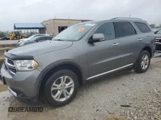 ✅ 2013 Dodge Durango Crew • VIN: 1C4RDJDG9DC554070 • Lot: 81421995. Listed on Copart with 157,824 mi. Free auction sales archive from the USA and detailed vehicle history report at DreamBid. Image 1.