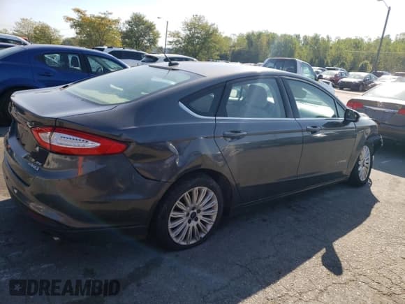 ✅ 2016 Ford Fusion SE Hybrid • VIN: 3FA6P0LU8GR292484 • Lot: 71780175. Listed on Copart with 244,801 mi. Free auction sales archive from the USA and detailed vehicle history report at DreamBid. Image 3.