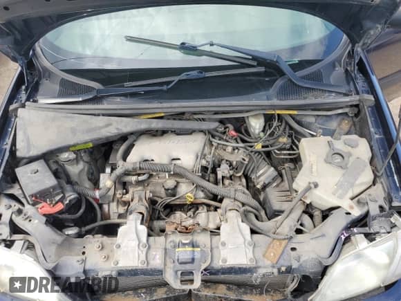 2003 Chevrolet Venture 1SV z VIN 1GNDU23E63D201673, wystawiony jako Copart lot #66824235 z przebiegiem 255 340 mil mil oraz Szkoda całkowita • Salvage title. Historia ofert i sprzedaży dostępna na DreamBid. Obrazek 12.