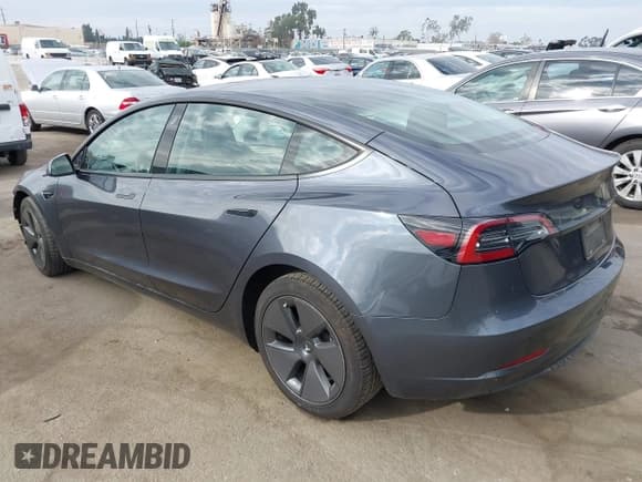 ✅ 2023 Tesla Model 3 • VIN: 5YJ3E1EA0PF644809 • Lot: 43271664. Listed on IAAI with 71,806 mi. Free auction sales archive from the USA and detailed vehicle history report at DreamBid. Image 3.