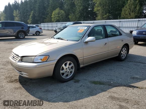 ✅ 1997 Toyota Camry LE • VIN: JT2BF22K4V0074975 • Lot: 83843615. Wystawiony na Copart z przebiegiem 254 354 mil. Bezpłatny archiwum sprzedaży aukcyjnych z USA i szczegółowy raport historii pojazdu na DreamBid. Zdjęcie 1.