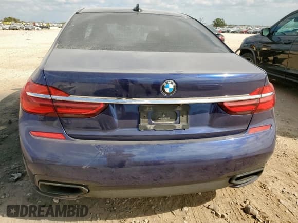 ✅ 2016 BMW 7 Series 750i • VIN: WBA7F0C53GGL99778 • Lot: 92937955. Listed on Copart with 105,323 mi. Free auction sales archive from the USA and detailed vehicle history report at DreamBid. Image 6.