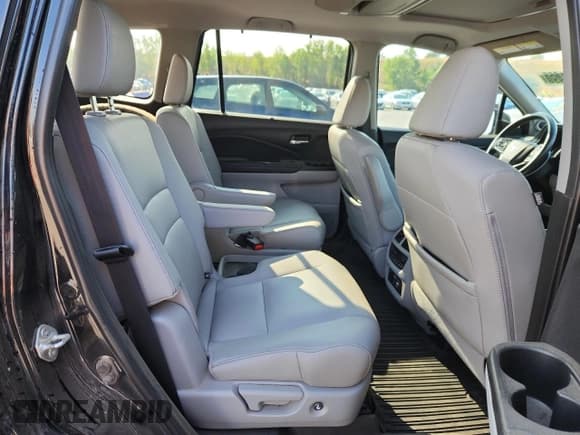 ✅ 2019 Honda Pilot Touring 7-Passenger • VIN: 5FNYF6H69KB092985 • Lot: 69071955. Listed on Copart with 128,915 mi. Free auction sales archive from the USA and detailed vehicle history report at DreamBid. Image 11.