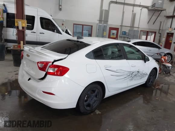 ✅ 2016 Chevrolet Cruze LS • VIN: 1G1BB5SMXG7272517 • Lot: 41283610. Listed on IAAI with 57,497 mi. Free auction sales archive from the USA and detailed vehicle history report at DreamBid. Image 4.