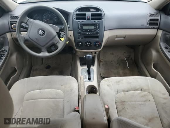 ✅ 2006 Kia Spectra EX • VIN: KNAFE121065291096 • Lot: 65343624. Wystawiony na Copart z przebiegiem 223 487 mil. Bezpłatny archiwum sprzedaży aukcyjnych z USA i szczegółowy raport historii pojazdu na DreamBid. Zdjęcie 8.