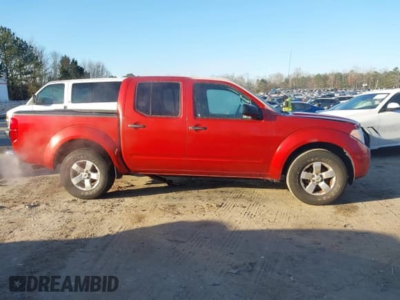 ✅ 2013 Nissan Frontier SV • VIN: 1N6AD0ER2DN730370 • Lot: 41405918. Listed on IAAI with 111,576 mi. Free auction sales archive from the USA and detailed vehicle history report at DreamBid. Image 13.