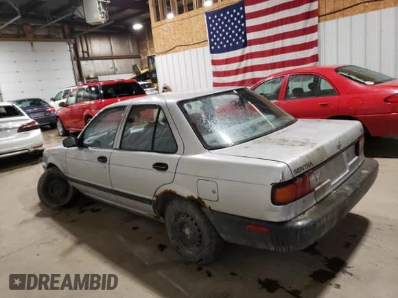 ✅ 1992 Nissan Sentra E • VIN: JN1EB31P6NU137119 • Лот: 67217954. Опубликован ранее на Copart с пробегом 169 694 миль. Бесплатный доступ к архиву аукционных продаж из США и подробный отчёт об истории автомобиля на DreamBid. Изображение 2.