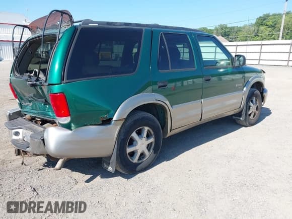 ✅ 2000 Oldsmobile Bravada • VIN: 1GHDT13W2Y2267004 • Лот: 42691851. Опубликован ранее на IAAI с пробегом 161 592 миль. Бесплатный доступ к архиву аукционных продаж из США и подробный отчёт об истории автомобиля на DreamBid. Изображение 4.