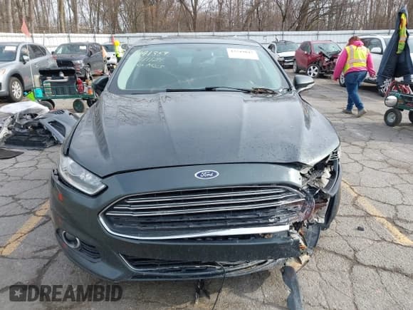 ✅ 2016 Ford Fusion Titanium • VIN: 3FA6P0K92GR135594 • Lot: 43749043. Listed on IAAI with 195,125 mi. Free auction sales archive from the USA and detailed vehicle history report at DreamBid. Image 11.