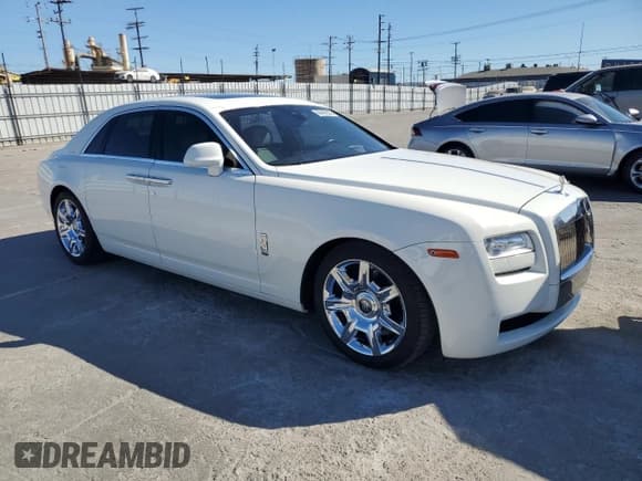 ✅ 2014 Rolls-Royce Ghost • VIN: SCA664S52EUX52508 • Lot: 66498245. Listed on Copart with 66,033 mi. Free auction sales archive from the USA and detailed vehicle history report at DreamBid. Image 4.