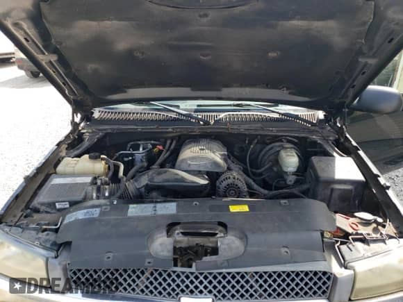 2005 Chevrolet Silverado 1500 LS z VIN 1GCEK19T35E177042, wystawiony jako Copart lot #70956164 z przebiegiem 84 434 mil mil oraz Czysty tytuł • Clean title. Historia ofert i sprzedaży dostępna na DreamBid. Obrazek 11.