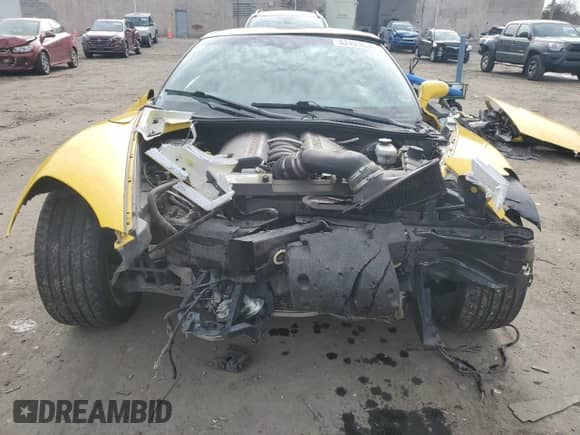 2006 Chevrolet Corvette with VIN 1G1YY26U165123036, listed as a Copart auction lot 82493634 with 112,367 mi miles and Salvage title. Bid and sale history available at DreamBid. Image 5.