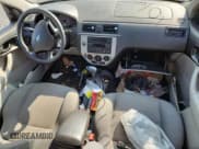 ✅ 2005 Ford Focus S • VIN: 3FAFP37N35R118159 • Лот: 86859825. Опубликован ранее на Copart с пробегом Не указан. Бесплатный доступ к архиву аукционных продаж из США и подробный отчёт об истории автомобиля на DreamBid. Изображение 8.