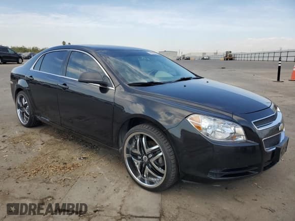 ✅ 2011 Chevrolet Malibu 1LS • VIN: 1G1ZB5E18BF311443 • Lot: 74610014. Listed on Copart with 188,923 mi. Free auction sales archive from the USA and detailed vehicle history report at DreamBid. Image 4.