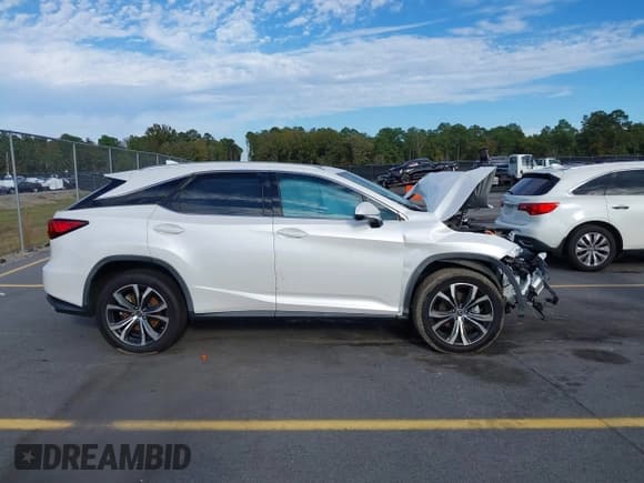 ✅ 2022 Lexus RX 350 • VIN: JTJHZMDA4N2058060 • Lot: 43476468. Listed on IAAI with 36,177 mi. Free auction sales archive from the USA and detailed vehicle history report at DreamBid. Image 12.