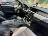 ✅ 2015 BMW M5 • VIN: WBSFV9C56FD595096 • Lot: 76574074. Listed on Copart with 61,779 mi. Free auction sales archive from the USA and detailed vehicle history report at DreamBid. Image 5.