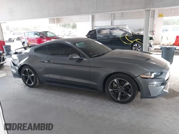 ✅ 2021 Ford Mustang EcoBoost • VIN: 1FA6P8TH4M5114569 • Lot: 43376525. Listed on IAAI with 22,091 mi. Free auction sales archive from the USA and detailed vehicle history report at DreamBid. Image 13.