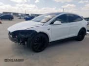 ✅ 2021 Tesla Model X Long Range Plus • VIN: 5YJXCAE29MF323752 • Lot: 64859025. Listed on Copart with 88,510 mi. Free auction sales archive from the USA and detailed vehicle history report at DreamBid. Image 1.