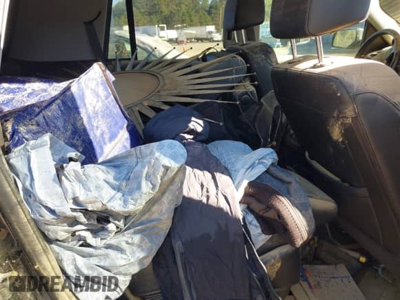 2020 Chevrolet Tahoe Premier z VIN 1GNSKCKJ4LR300528, wystawiony jako IAAI lot #40523016 z przebiegiem Nie podano mil oraz . Historia ofert i sprzedaży dostępna na DreamBid. Obrazek 8.