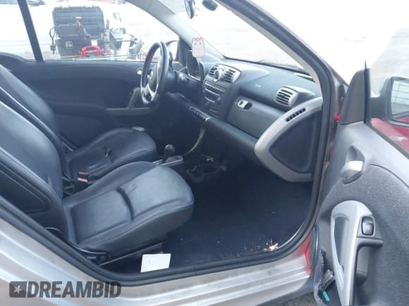 ✅ 2009 Smart fortwo Pure • VIN: WMEEJ31X19K237406 • Lot: 42813550. Listed on IAAI with 50,254 mi. Free auction sales archive from the USA and detailed vehicle history report at DreamBid. Image 5.