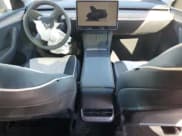 ✅ 2024 Tesla Model Y • VIN: 7SAYGDED5RA308071 • Lot: 82518185. Listed on Copart with 15,104 mi. Free auction sales archive from the USA and detailed vehicle history report at DreamBid. Image 8.