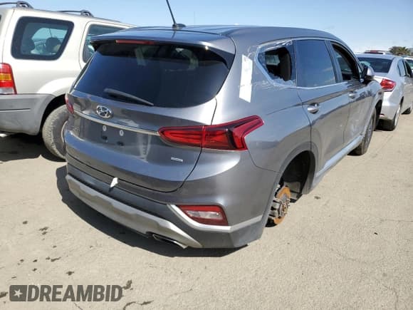 ✅ 2019 Hyundai Santa Fe SE • VIN: 5NMS2CAD9KH095196 • Lot: 43764763. Wystawiony na Copart z przebiegiem Nie podano. Bezpłatny archiwum sprzedaży aukcyjnych z USA i szczegółowy raport historii pojazdu na DreamBid. Zdjęcie 3.