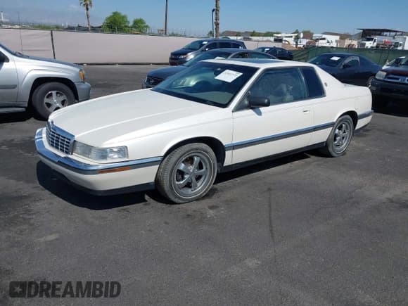 ✅ 1992 Cadillac Eldorado • VIN: 1G6EL13B7NU602459 • Лот: 42412372. Опубликован ранее на IAAI с пробегом 89 631 миль. Бесплатный доступ к архиву аукционных продаж из США и подробный отчёт об истории автомобиля на DreamBid. Изображение 17.