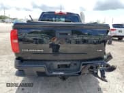 ✅ 2021 Chevrolet Colorado 4WD LT • VIN: 1GCGTCEN4M1142105 • Лот: 61189554. Опубликован ранее на Copart с пробегом 18 272 миль. Бесплатный доступ к архиву аукционных продаж из США и подробный отчёт об истории автомобиля на DreamBid. Изображение 6.