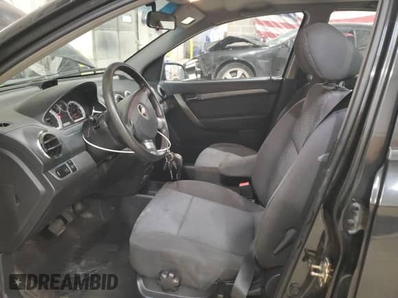 2007 Chevrolet Aveo LT z VIN KL1TG56627B117733, wystawiony jako Copart lot #42429865 z przebiegiem 138 919 mil mil oraz Szkoda całkowita • Salvage title. Historia ofert i sprzedaży dostępna na DreamBid. Obrazek 7.