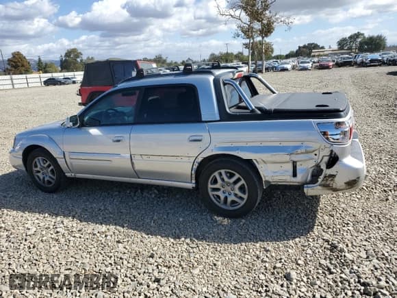 ✅ 2003 Subaru Baja • VIN: 4S4BT61C037102174 • Лот: 85503915. Опубликован ранее на Copart с пробегом 234 274 миль. Бесплатный доступ к архиву аукционных продаж из США и подробный отчёт об истории автомобиля на DreamBid. Изображение 2.