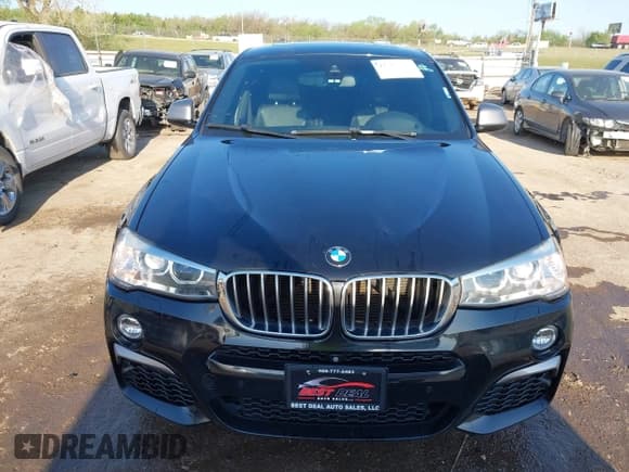 ✅ 2016 BMW X4 M40i • VIN: 5UXXW7C59G0M91223 • Lot: 42009394. Listed on IAAI with 144,771 mi. Free auction sales archive from the USA and detailed vehicle history report at DreamBid. Image 12.
