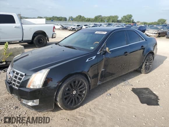 ✅ 2012 Cadillac CTS Premium • VIN: 1G6DS5E37C0133521 • Lot: 66398625. Listed on Copart with 125,475 mi. Free auction sales archive from the USA and detailed vehicle history report at DreamBid. Image 1.