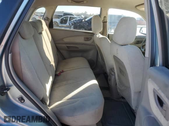 2005 Hyundai Tucson GL z VIN KM8JM12BX5U168799, wystawiony jako Copart lot #84709184 z przebiegiem 127 109 mil mil oraz Szkoda całkowita • Salvage title. Historia ofert i sprzedaży dostępna na DreamBid. Obrazek 11.