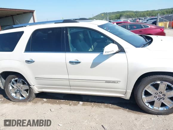 ✅ 2013 GMC Acadia Denali • VIN: 1GKKRTKD4DJ209391 • Lot: 43129576. Listed on IAAI with 129,017 mi. Free auction sales archive from the USA and detailed vehicle history report at DreamBid. Image 14.