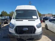✅ 2021 Ford Transit Cargo • VIN: 1FTBW3X83MKA14151 • Lot: 43493696. Wystawiony na IAAI z przebiegiem 102 256 mil. Bezpłatny archiwum sprzedaży aukcyjnych z USA i szczegółowy raport historii pojazdu na DreamBid. Zdjęcie 12.