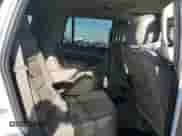 2015 Chevrolet Tahoe LTZ with VIN 1GNSKCKC1FR118128, listed as a Copart auction lot 89589135 with 129,932 mi miles and Salvage title. Bid and sale history available at DreamBid. Image 11.