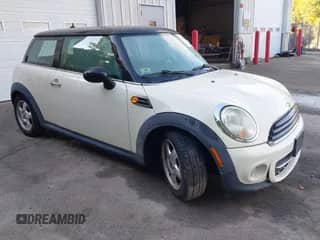 2011 MINI Hardtop with VIN WMWSU3C57BT091305, listed as a IAAI auction lot 43382263 with 150,604 mi miles and . Bid and sale history available at DreamBid. Image 1.