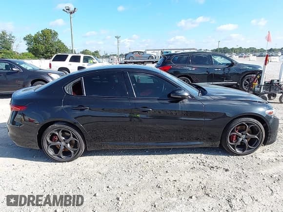 ✅ 2018 Alfa Romeo Giulia Ti Sport • VIN: ZARFAEEN4J7574429 • Лот: 43158939. Опубликован ранее на IAAI с пробегом 73 350 миль. Бесплатный доступ к архиву аукционных продаж из США и подробный отчёт об истории автомобиля на DreamBid. Изображение 13.