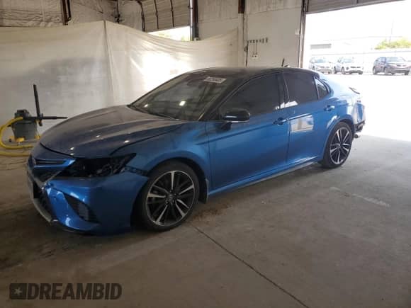 2020 Toyota Camry XSE with VIN 4T1K61AK3LU335453, listed as a Copart auction lot 80260405 with 89,788 mi miles and Salvage title. Bid and sale history available at DreamBid. Image 1.